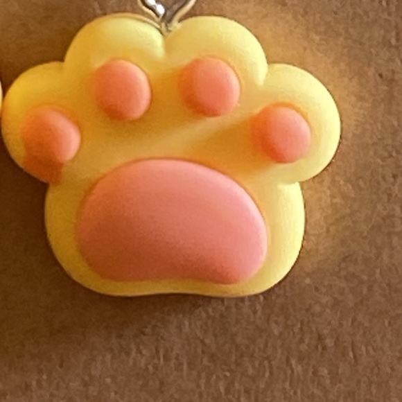 Orange and yellow dog paw earrings with silver wires and random gift bag - Picture 2 of 5